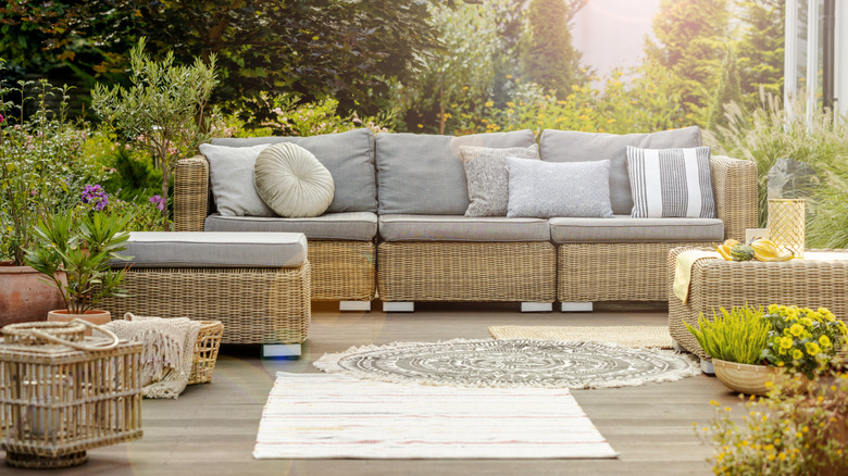 Outdoor rattan furniture in a garden