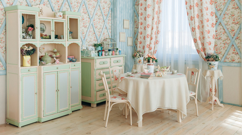 A dining room decorated in pastel colors