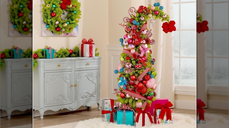 Colorfully decorated Christmas tree with whimsical curving top