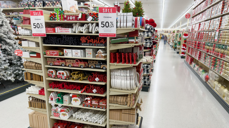 hobby lobby Christmas decor on shelves with 50% sale signs