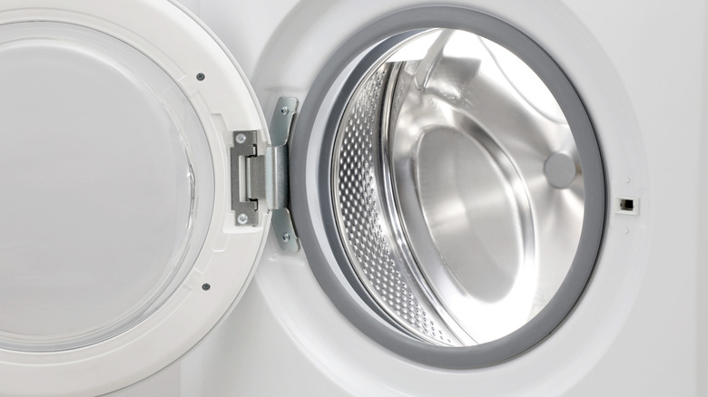 empty dryer drum with lid open