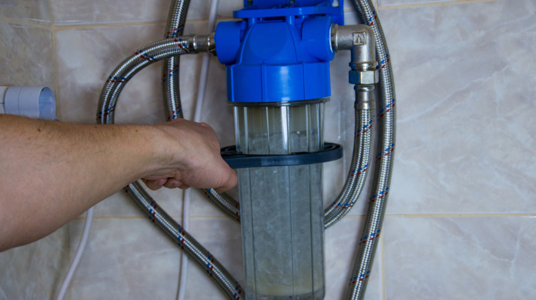 hand installing water softener