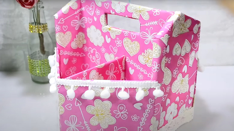 DIY pink desk organizer with handle and tassels