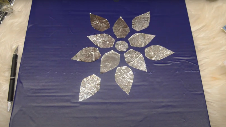 Upcycled Pizza box and aluminum foil wall decor DIY