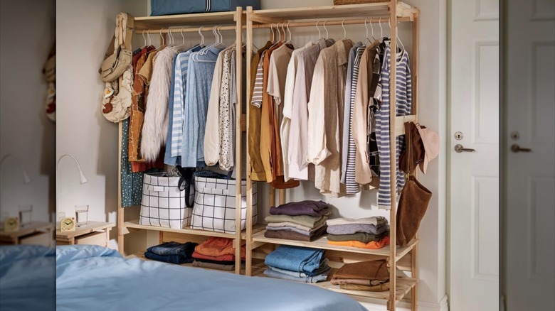 IKEA open wardrobes side by side in bedroom setting
