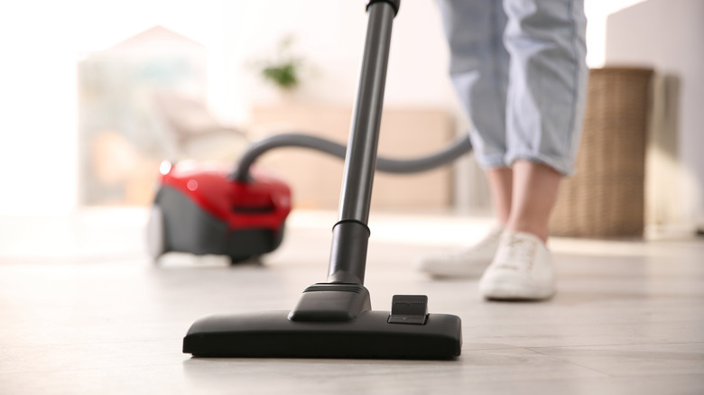 Person vacuuming home