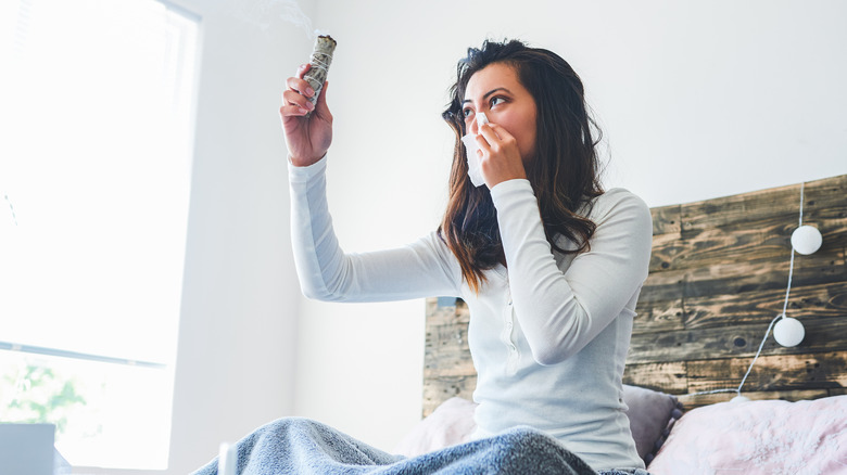 Burning sage in bedroom