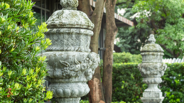 Two carved antique garden urns