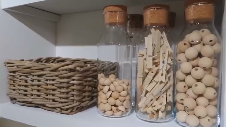 IKEA carafes used for craft or office supplies storage