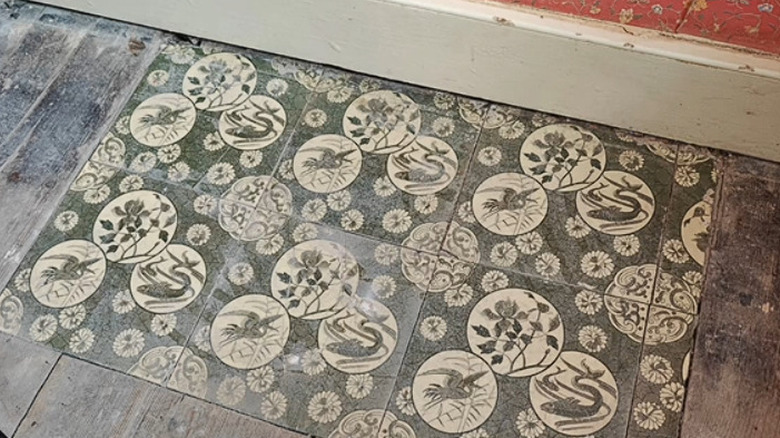 The green Minton tiles discovered in the cottage renovation,