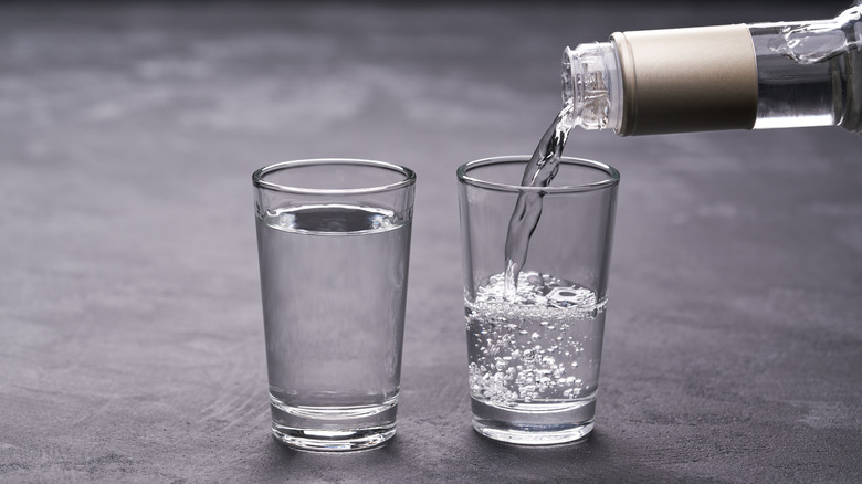 Vodka being poured into glass