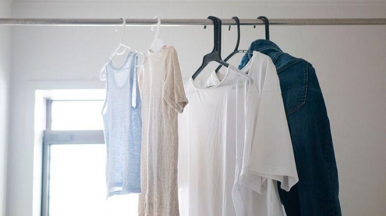 Clothes hanging in bathroom
