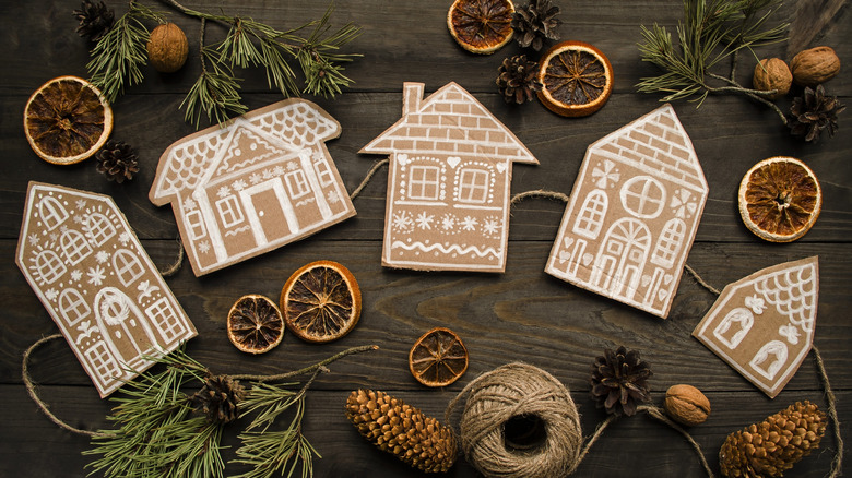 cardboard gingerbread houses on a string