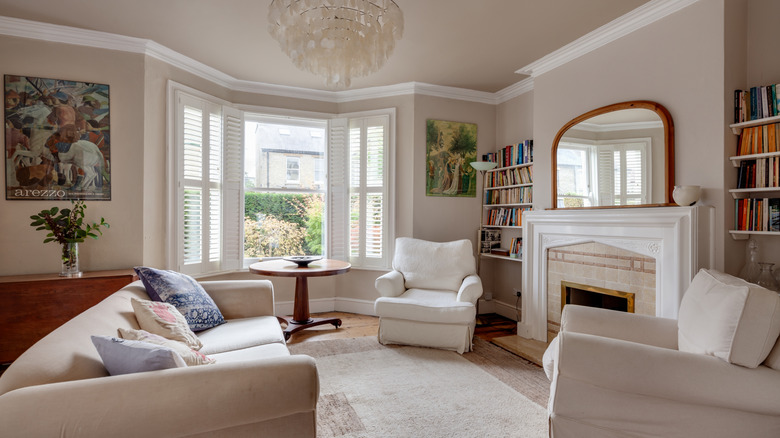 Stark white crown molding in modernized period home