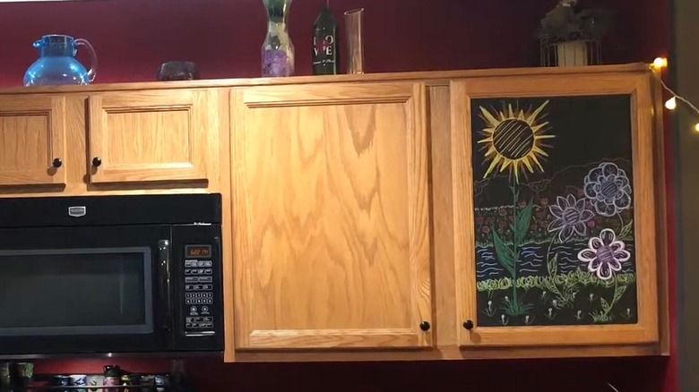 kitchen with a blackboard cabinet