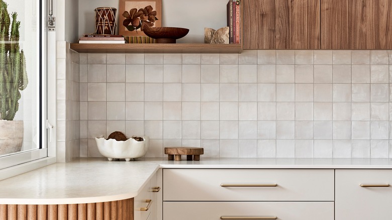 fluted, white, and wooden cabinets
