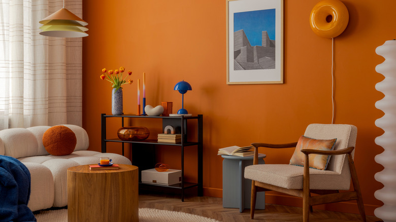 living room with a mix of mid-century and modern design elements with color accessories