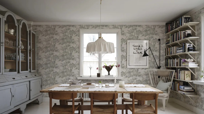 Gray floral wallpaper in dining room