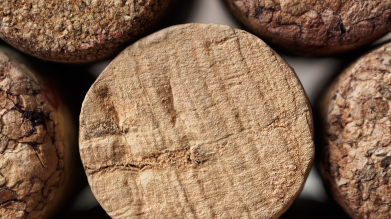 multiple wine corks lined up side by side