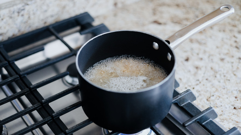 pot on the stove with boiling water
