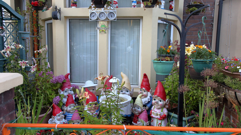 Front patio overcrowded with garden gnomes
