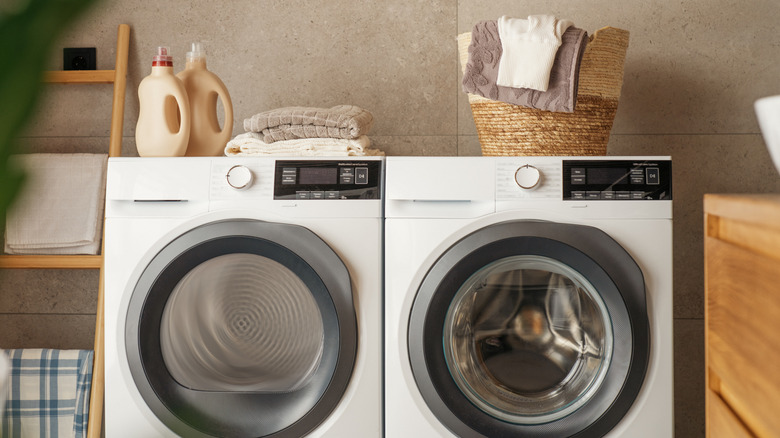 Washing machine and dryer set in laundry room
