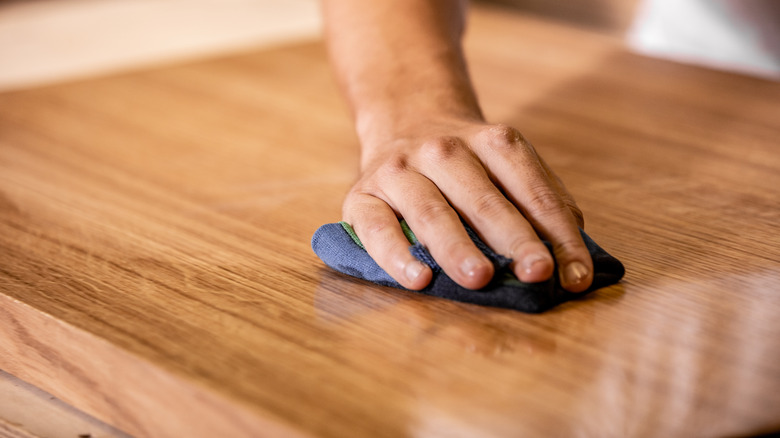 Wiping wood with oil