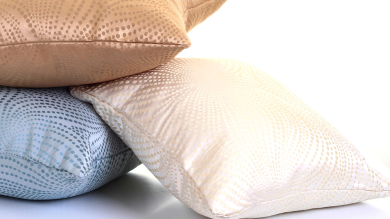 Three tricolor pillow inserts.