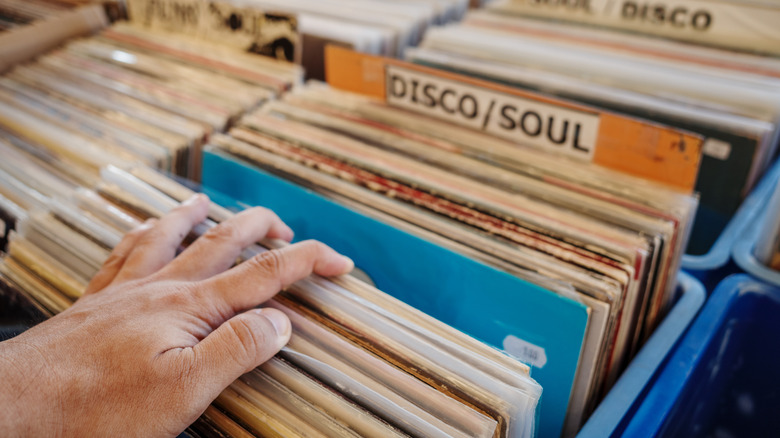 vinyl records stored vertically in a box