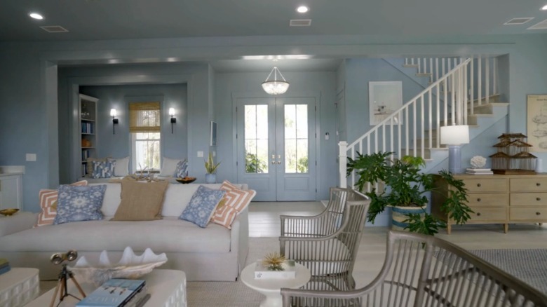A blue living room with a coastal design in the HGTV Dream House