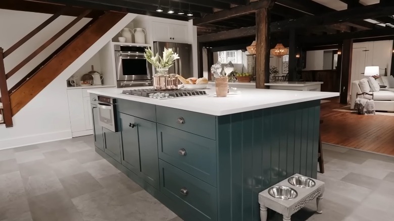 renovated kitchen with blue island