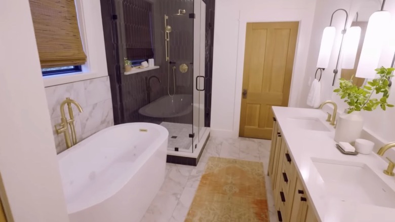 Bathroom with shower and bathtub