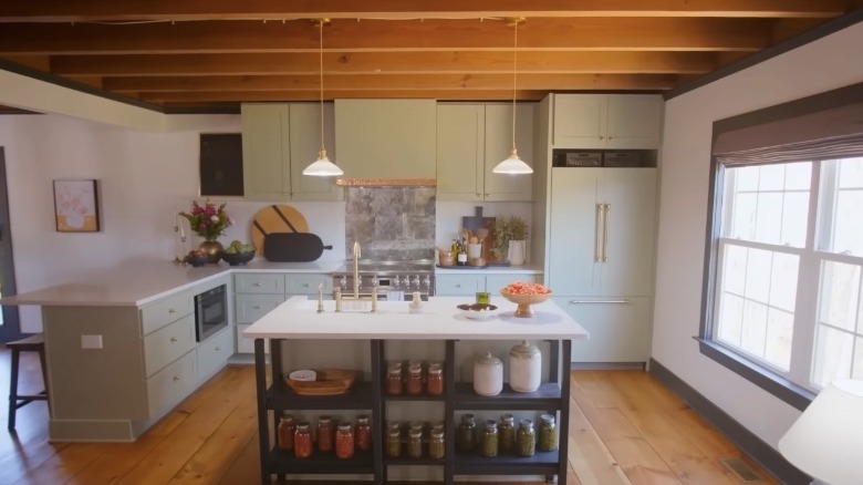 Kitchen with wooden ceiling joists