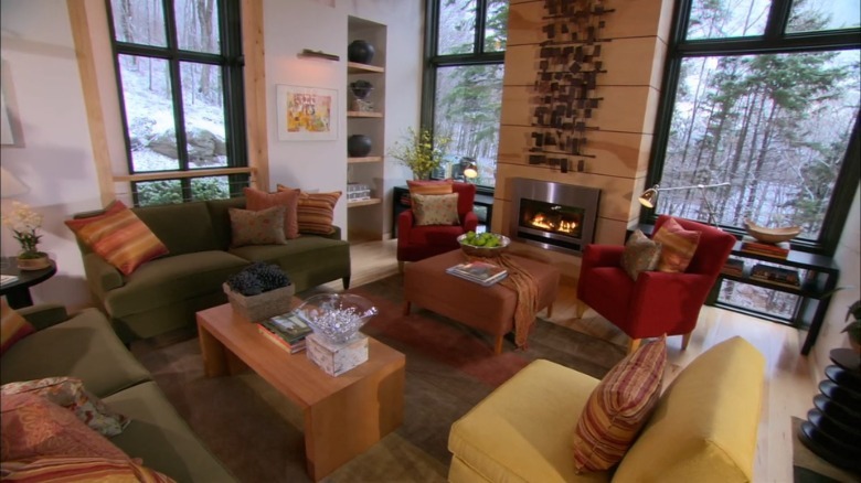 The great room in HGTV's 2011 Dream Home with a fireplace and colorful furniture