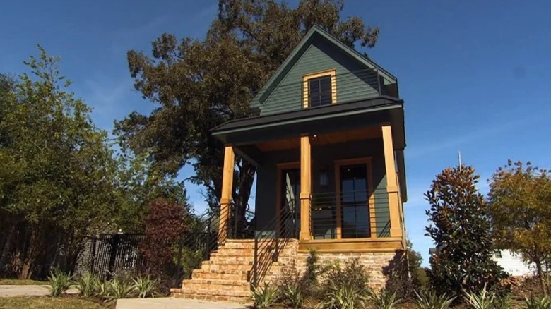 Green house with stone steps