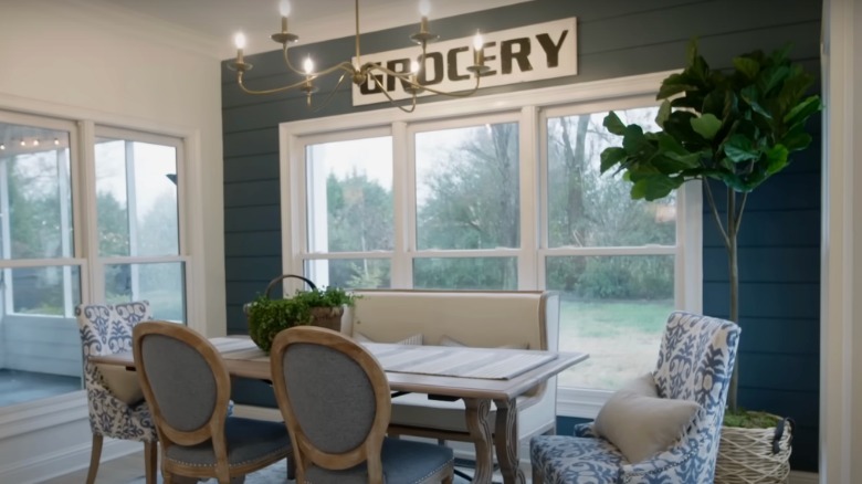 A farmhouse dining room with blue accents.